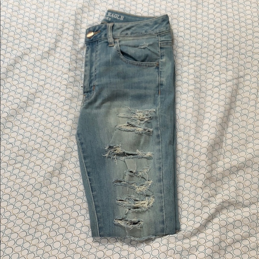 Light blue ripped jeans